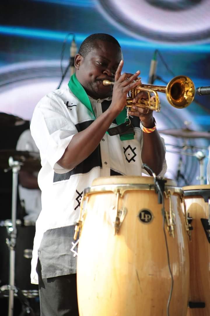 Haston Kombe playing trumpet